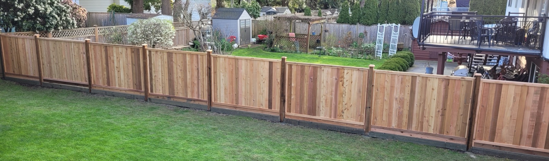 A long cedar fence run